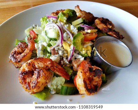 Healthy Shrimp Cobb Salad; Healthy Foods, Healthy Living, Food Choices, Nutrient Rich Foods, Top View, Menu Items; Safety in Eating Out Royalty-Free Stock Photo #1108319549