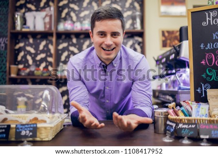 Photo of smiling male barista