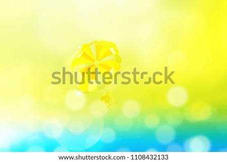Summer blur background with parachute and sunshine, sea vacation, tinted photo collage