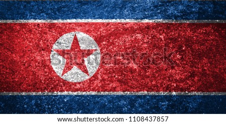 Texture of the flag of  Democratic People's Republic of Korea on marble tiles.