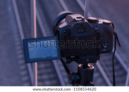 The camera shoots at the bridge