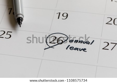 writing on calendar annual leave Royalty-Free Stock Photo #1108575734