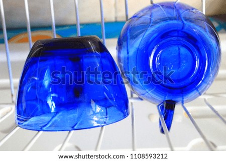  two glass blue cups clean and lay to dry 
