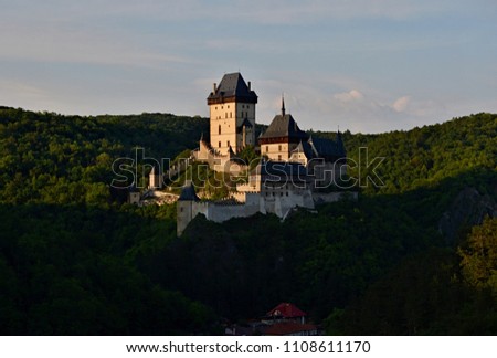 Aerial view to The Karlstejn castle. Royal palace founded King Charles IV. Amazing gothic monument in Czech Republic