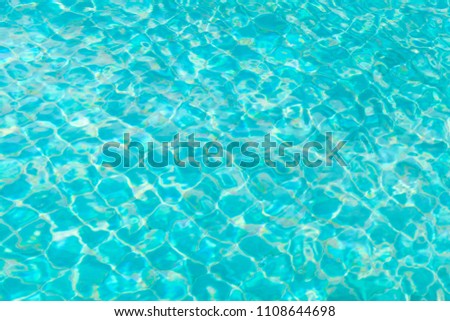 The green water reflects the beautiful light. Green background