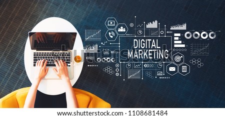 Digital Marketing with person using a laptop on a white table Royalty-Free Stock Photo #1108681484