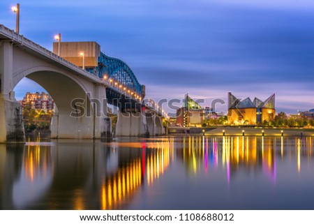 Chattanooga, Tennessee, USA downtown skyline on the Tennessee River at dusk. Royalty-Free Stock Photo #1108688012