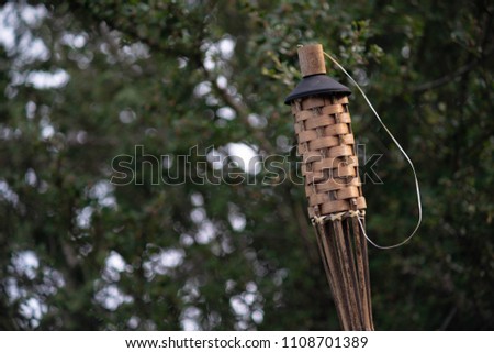 Wooden fire light tropical post