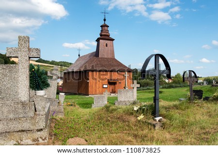 The Greek Catholic wooden church of St Lucas the Evangelist located at cemetery in Krive, Slovakia