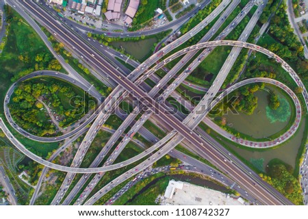 Aerial view traffic junction road with U turn lane city transport industry