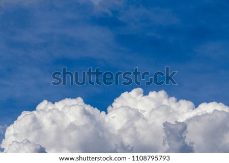 White cloud on a clear blue sky