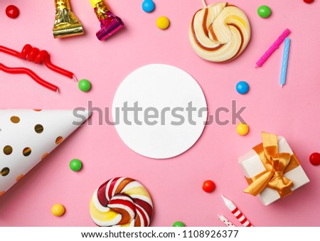 Flat lay composition with birthday party items on color background