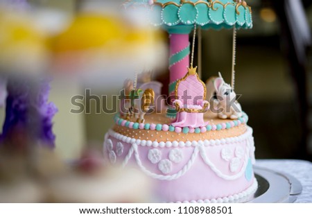 birthday cake and sweets  on decorated table to party time celebration for two year old girl