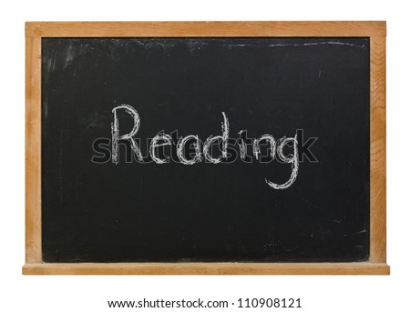 Reading written in chalk on a blackboard isolated on white
