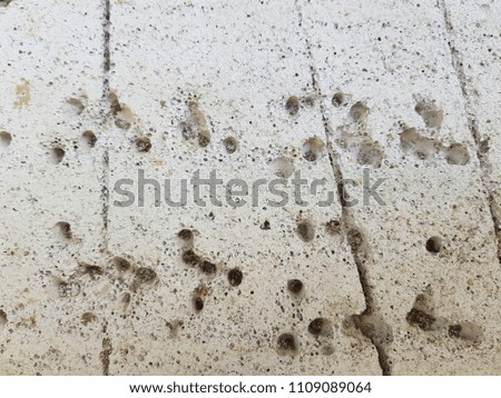 texture of white porous stone. foam concrete. foambloc Gray porous wall texture for background.