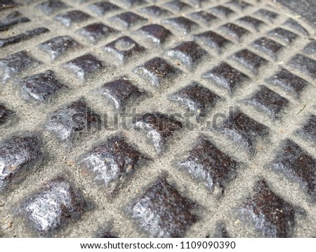 Rusty steel plate texture and background. Old grungy metal floor seamless of steel sheet metallic. It's silver with rhombus shapes for design art work, backdrop or skin product.