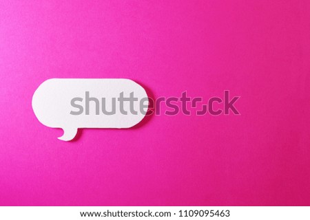 Paper bubble speech shapes on color background, ideal for your communication projects or paper topics.