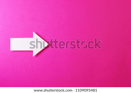 Paper arrow shapes on color background, ideal for your creative projects or direction topics.