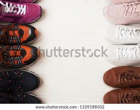 Shoes on the wooden shelf in the store