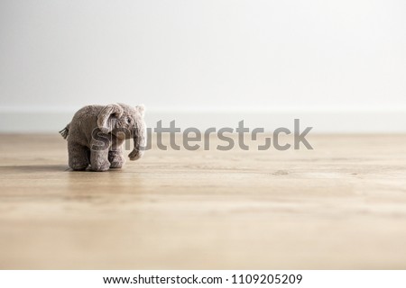 Toy elephant in the children's room.  Background
