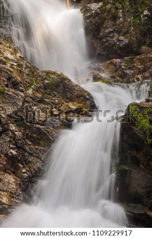Beautiful waterfall in the middle of rock massive. Kmetov waterfall, Kme?ov vodopád, High Tatras, Slovakia