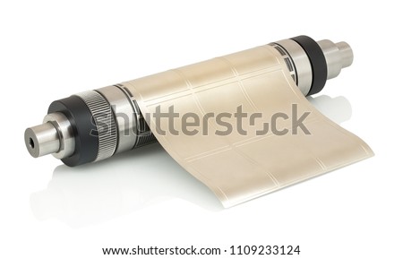 Magnetic cylinder with attached flexible die for die cutting on rotary, flexographic or in-line press printing machine used for label manufacturing isolated on white background with shadow reflection. Royalty-Free Stock Photo #1109233124