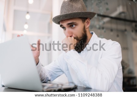 No ideas. Virus detection, spam, blackmail. Frustrated and tired man using laptop computer, deadline.