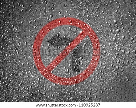 No left turn road sign painted on metal surface covered with rain drops