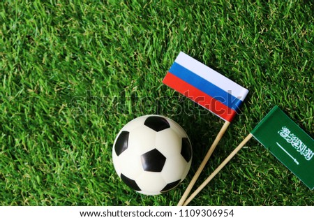 football on Green grass match World cup 2018 Russia vs Saudi Arabia flag