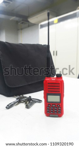 Red radio and electrical keys& lockout, working table in electrical room
