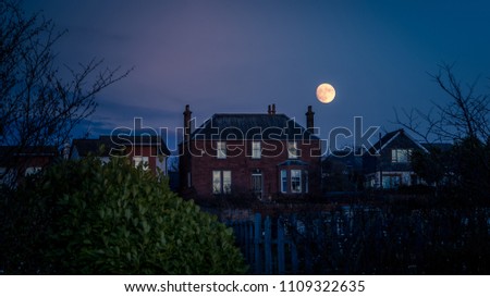 full moon in the town