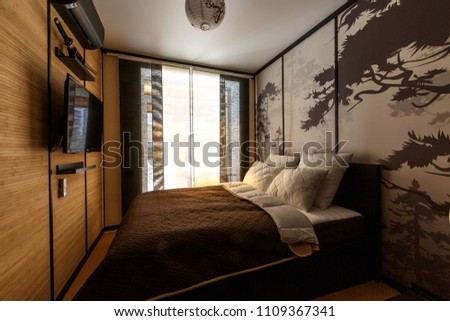 cozy small studio bedroom, designed and furnished