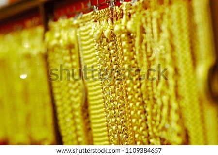 Picture close up many types of gold bracelet