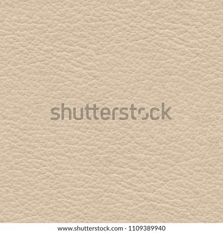 Ideal light leather background for project. Seamless square texture, tile ready.