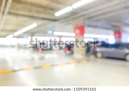 Blurred bokeh car parking indoor building transport background