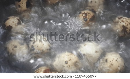 Quail eggs cooked in boiling water.