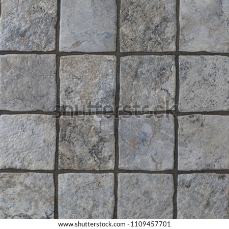 texture of a tile, pattern with a gray mosaic background, abstract geometry