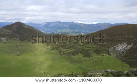 Spectacular mountains with blue sky and clouds with green vegetation. Peaks of Europe. Asturias Spain