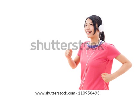 a young asian woman wearing training wear running on white background