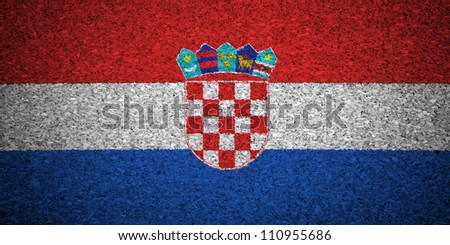 The Croatian flag painted on a cork board.