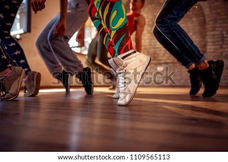 leg swings during fitness training close up Royalty-Free Stock Photo #1109565113