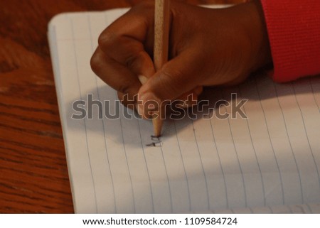 Hand writing on Notebook