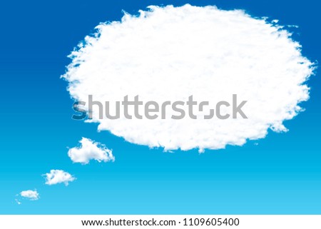 White cloud in the sky with the shape of a cartoon thinking balloon.