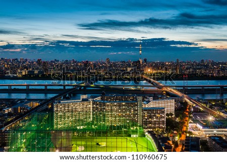 View of Tokyo city at twilight with tokyo skytree and sumida river on the background
