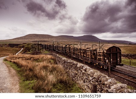 Logging train crossing the Ribblehead Viaduct, Yorkshire Dales National Park