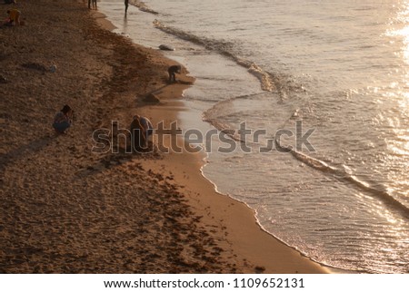 Evening on shore of the Baltic Sea. Sunset on the beach.