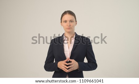 Portrait of a young charming businesswoman isolated
