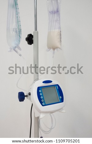  ePump Enteral Feeding Pump with dual feeding bags on double hook iv stand Royalty-Free Stock Photo #1109705201