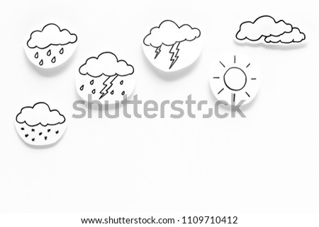 Modern weather icons set on white background top view copy space