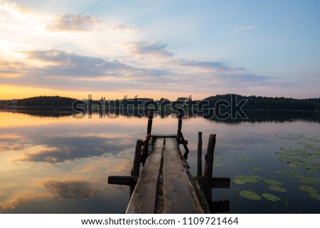 Sunset over the lake in Lithuania Royalty-Free Stock Photo #1109721464